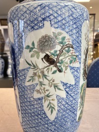 A Chinese blue, white and famille verte rouleau vase with figural and peacock design, Qianlong mark, 19th C.