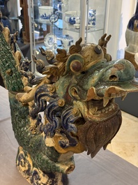 A pair of large Chinese polychrome-glazed Shiwan stoneware dragons, 19th C.
