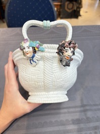 A Meissen kakiemon-style basket with figural head handles, Germany, 18th C.