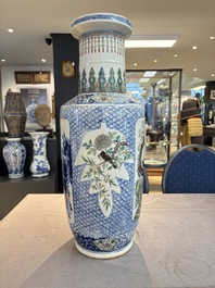 A Chinese blue, white and famille verte rouleau vase with figural and peacock design, Qianlong mark, 19th C.