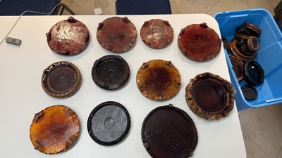 A large collection of 100 Chinese wooden stands, 19/20th C.