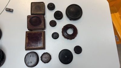 A large collection of 100 Chinese wooden stands, 19/20th C.