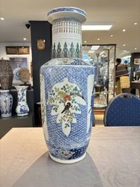 A Chinese blue, white and famille verte rouleau vase with figural and peacock design, Qianlong mark, 19th C.