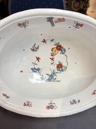 A Meissen kakiemon-style basket with figural head handles, Germany, 18th C.