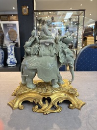 * A gilt-bronze-mounted celadon-glazed group of three figures riding an elephant, probably Samson, Paris, 19th C.