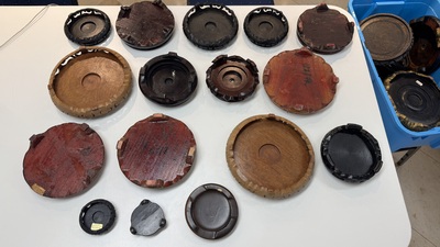 A large collection of 100 Chinese wooden stands, 19/20th C.