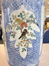 A Chinese blue, white and famille verte rouleau vase with figural and peacock design, Qianlong mark, 19th C.