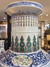A Chinese blue, white and famille verte rouleau vase with figural and peacock design, Qianlong mark, 19th C.