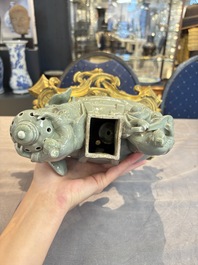 * A gilt-bronze-mounted celadon-glazed group of three figures riding an elephant, probably Samson, Paris, 19th C.
