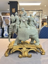 * A gilt-bronze-mounted celadon-glazed group of three figures riding an elephant, probably Samson, Paris, 19th C.