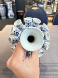 A blue and white Dutch Delft tulip vase, 19th C.