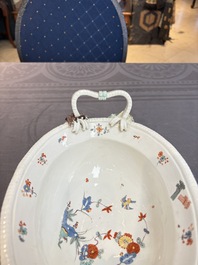A Meissen kakiemon-style basket with figural head handles, Germany, 18th C.