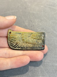 An Egyptian turquoise-glazed composition winged scarab, Ptolemaic, 4/1st C. B.C.