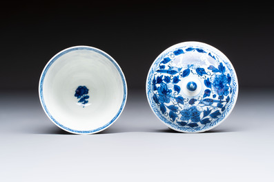 A Chinese blue and white covered ewer, a rose water sprinkler, a covered cup and saucer, jade 玉 and twin-fish mark, Kangxi