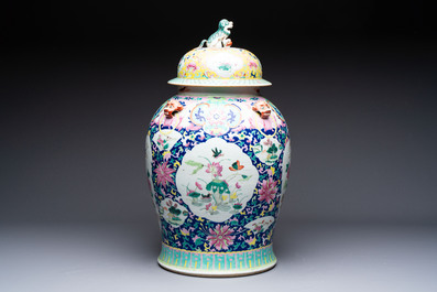 A large Chinese famille rose vase with lion-form handles and cover, 19th C.