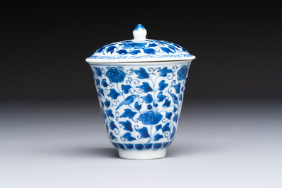 A Chinese blue and white covered ewer, a rose water sprinkler, a covered cup and saucer, jade 玉 and twin-fish mark, Kangxi