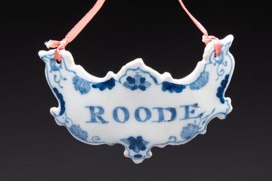 Five blue and white Dutch Delft 'Wine' labels, 18th C.