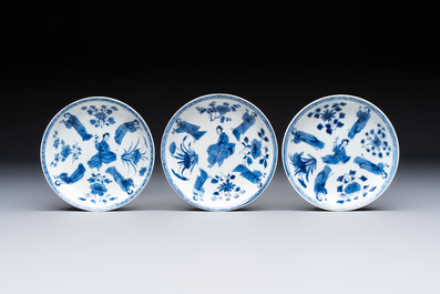 Three Chinese blue and white 'Elegant Beauties' cups and saucers, Chenghua and jade marks, Kangxi