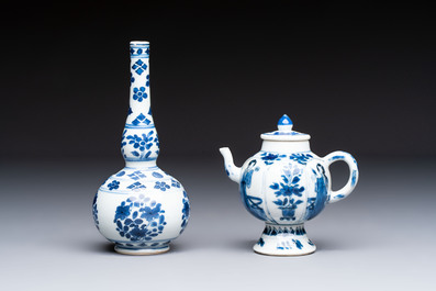 A Chinese blue and white covered ewer, a rose water sprinkler, a covered cup and saucer, jade 玉 and twin-fish mark, Kangxi
