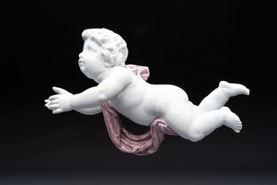 A pair of manganese and white Delftware putti, France or Germany, 19th C.