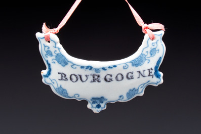 Five blue and white Dutch Delft 'Wine' labels, 18th C.