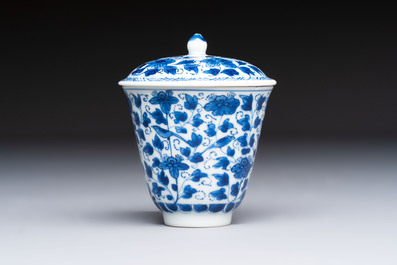 A Chinese blue and white covered ewer, a rose water sprinkler, a covered cup and saucer, jade 玉 and twin-fish mark, Kangxi