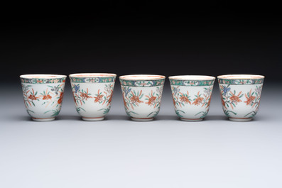 Five Chinese famille verte cups and saucers with floral design, 19th C.