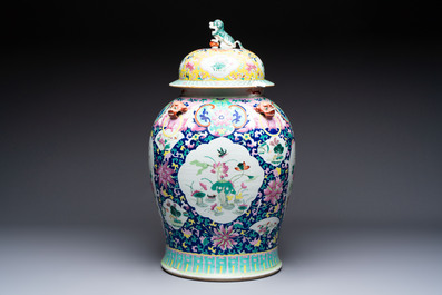 A large Chinese famille rose vase with lion-form handles and cover, 19th C.
