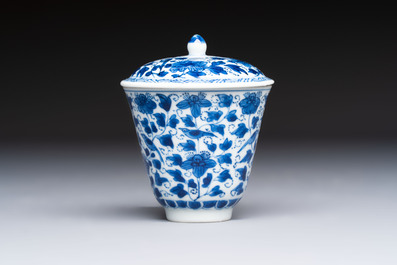 A Chinese blue and white covered ewer, a rose water sprinkler, a covered cup and saucer, jade 玉 and twin-fish mark, Kangxi