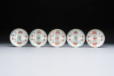 Five Chinese famille verte cups and saucers with floral design, 19th C.