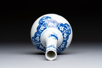 Three Chinese blue and white 'Fish' bowls and a bottle vase, Kangxi marks, 19th C.