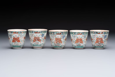Five Chinese famille verte cups and saucers with floral design, 19th C.