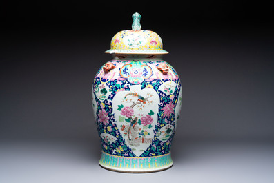 A large Chinese famille rose vase with lion-form handles and cover, 19th C.