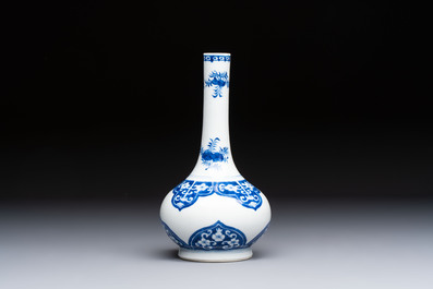 Three Chinese blue and white 'Fish' bowls and a bottle vase, Kangxi marks, 19th C.