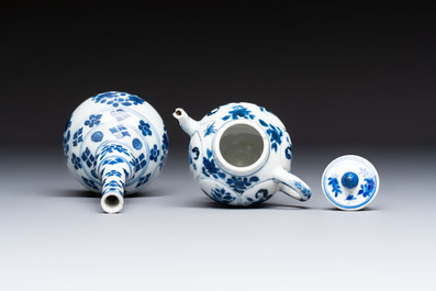 A Chinese blue and white covered ewer, a rose water sprinkler, a covered cup and saucer, jade 玉 and twin-fish mark, Kangxi