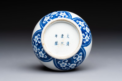 Three Chinese blue and white 'Fish' bowls and a bottle vase, Kangxi marks, 19th C.
