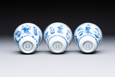 Three Chinese blue and white 'Elegant Beauties' cups and saucers, Chenghua and jade marks, Kangxi