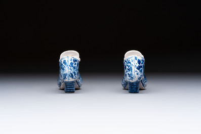 A pair of blue and white Delftware shoes with floral design, France, 18th C.