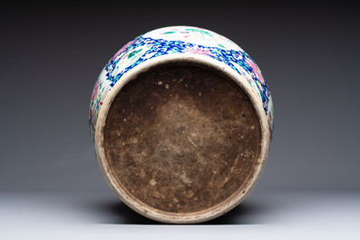 A large Chinese famille rose vase with lion-form handles and cover, 19th C.