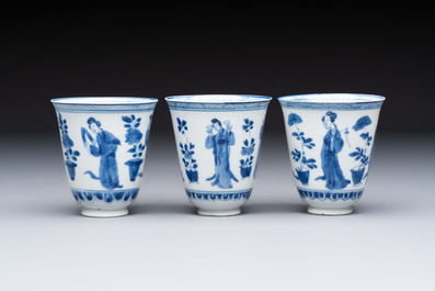 Three Chinese blue and white 'Elegant Beauties' cups and saucers, Chenghua and jade marks, Kangxi
