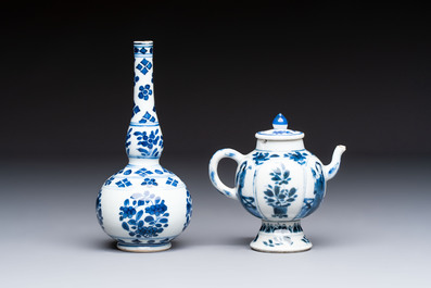 A Chinese blue and white covered ewer, a rose water sprinkler, a covered cup and saucer, jade 玉 and twin-fish mark, Kangxi