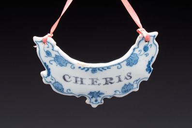 Five blue and white Dutch Delft 'Wine' labels, 18th C.