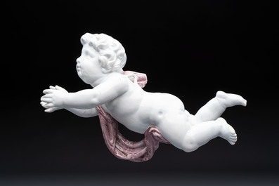 A pair of manganese and white Delftware putti, France or Germany, 19th C.