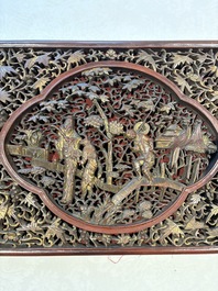 Six Chinese gilt-lacquered carved wooden panels with narrative design, 19th C.