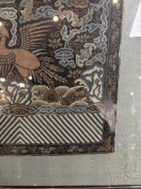 A Chinese silk kesi 'silver pheasant' or 'fifth rank' rank badge, Qing
