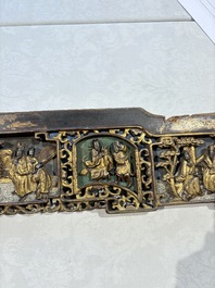 Six Chinese gilt-lacquered carved wooden panels with narrative design, 19th C.