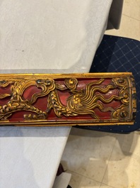 Six Chinese gilt-lacquered carved wooden panels with narrative design, 19th C.