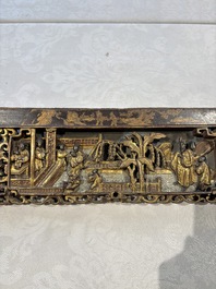 Six Chinese gilt-lacquered carved wooden panels with narrative design, 19th C.