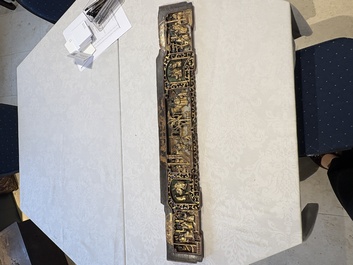 Six Chinese gilt-lacquered carved wooden panels with narrative design, 19th C.