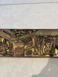 Six Chinese gilt-lacquered carved wooden panels with narrative design, 19th C.